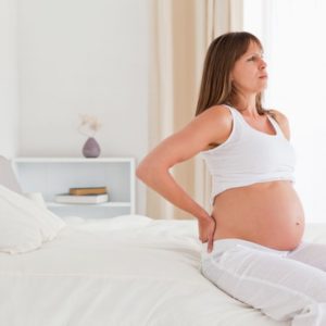 Πόνος στη μέση κατά τη διάρκεια της εγκυμοσύνης και πώς να τον αντιμετωπίσετε